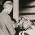 Doctor examining alien immigrants at Ellis Island