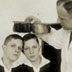 Otmar von Verschuer examines hair color of twin boys